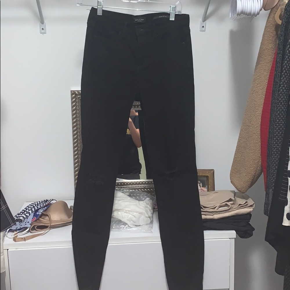 black ripped skinny jeans